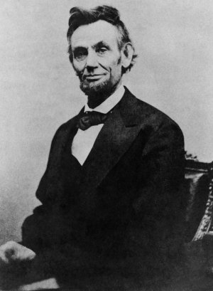 Abraham_Lincoln_half_length_seated,_April_10,_1865.jpg