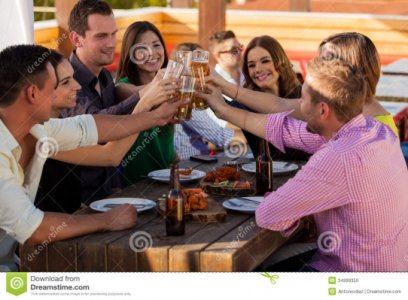 i-ll-drink-to-large-group-friends-having-fun-drinking-beer-restaurant-34999350.jpg