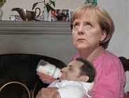 -Merkel-Babysitting-Nicolas-Sarkozy-s-Baby---91541.jpg