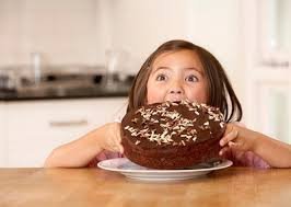 chocolate-cake-with-a-funny-expression-on-her-face.jpg