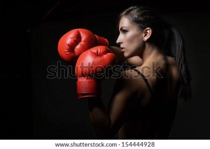 h-the-red-boxing-gloves-black-background-154444928.jpg