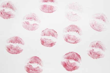 lipstick-kisses-paper_23-2148021139.jpg
