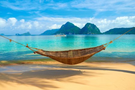 Beautiful-seaside-scenery-and-hammock-Stock-Photo.jpg