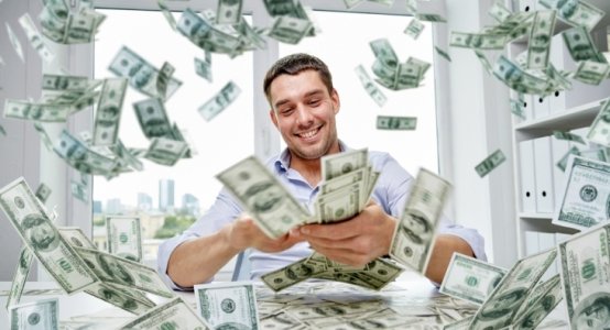 MoneyMagpie_Man-Surrounded-By-Dollar-Bills-Cash-e1508757276593-730x396.jpg