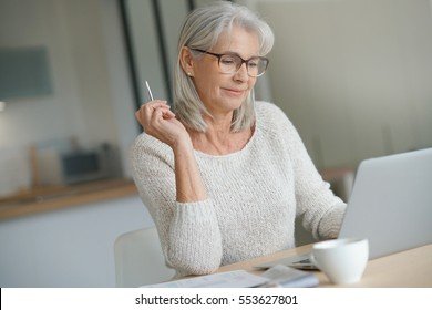 senior-woman-home-websurfing-on-260nw-553627801.jpg