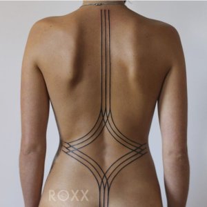 stunning-lines-back-tattoo.jpg
