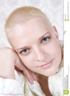 portrait-young-smiling-bald-bold-woman-9171138.jpg